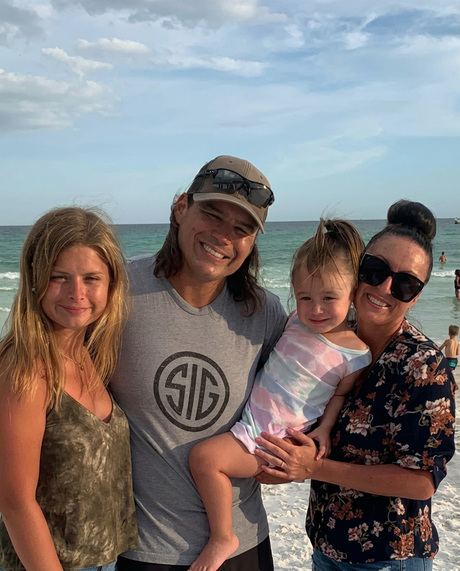 Matthew Brown with his family at the beach